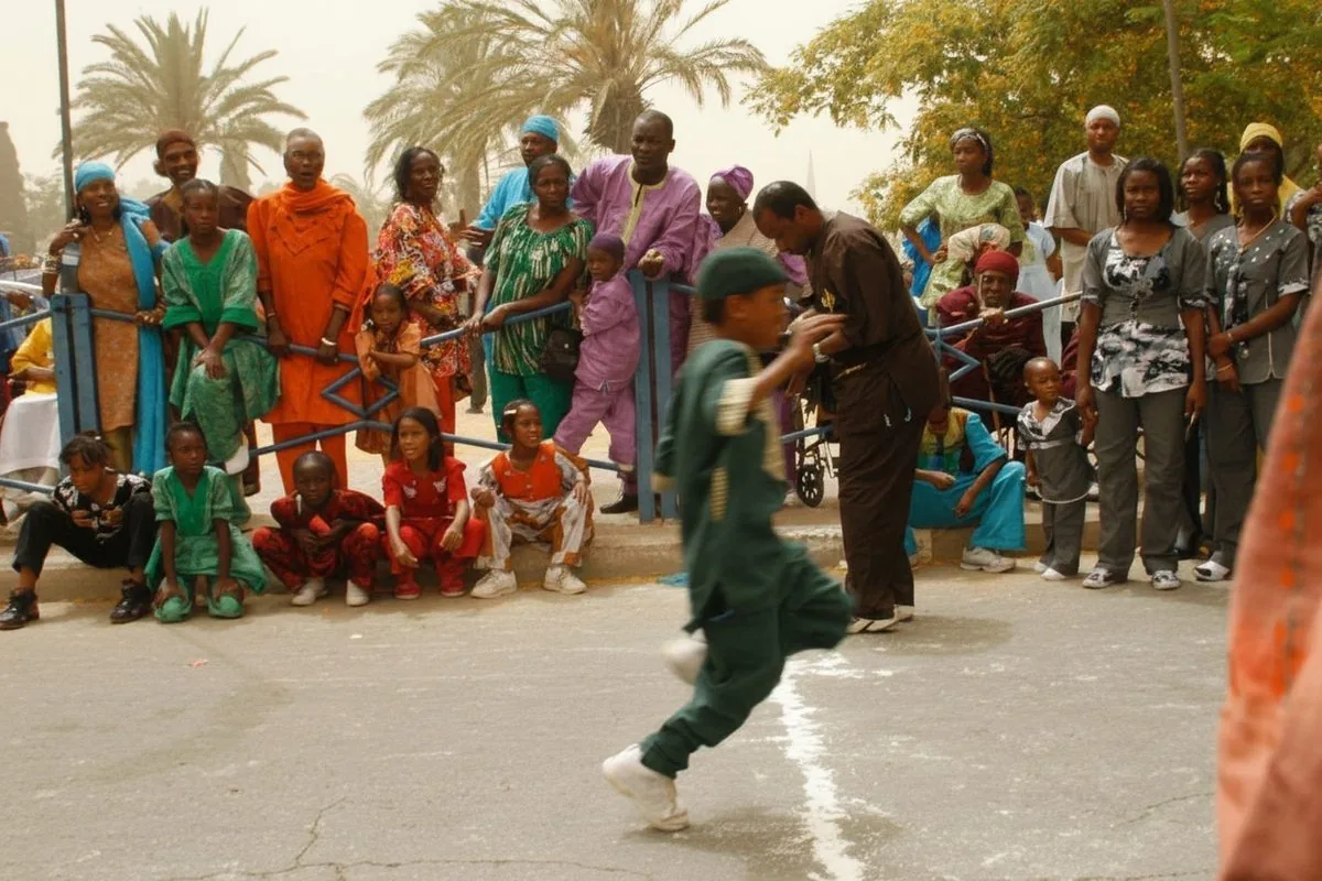 Young boy breakdancing in the centre of a crowd circle, Village of Peace celebration